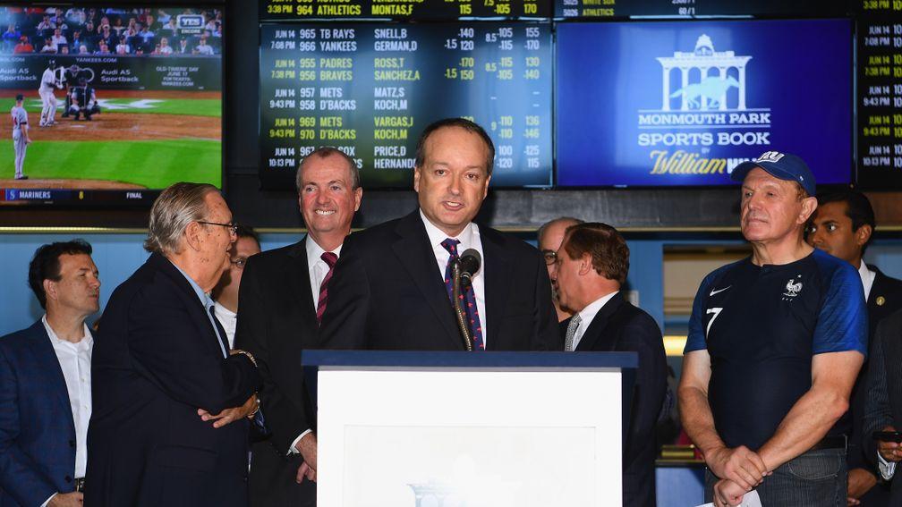William Hill US chief executive Joe Asher (centre) is partnering with IGT