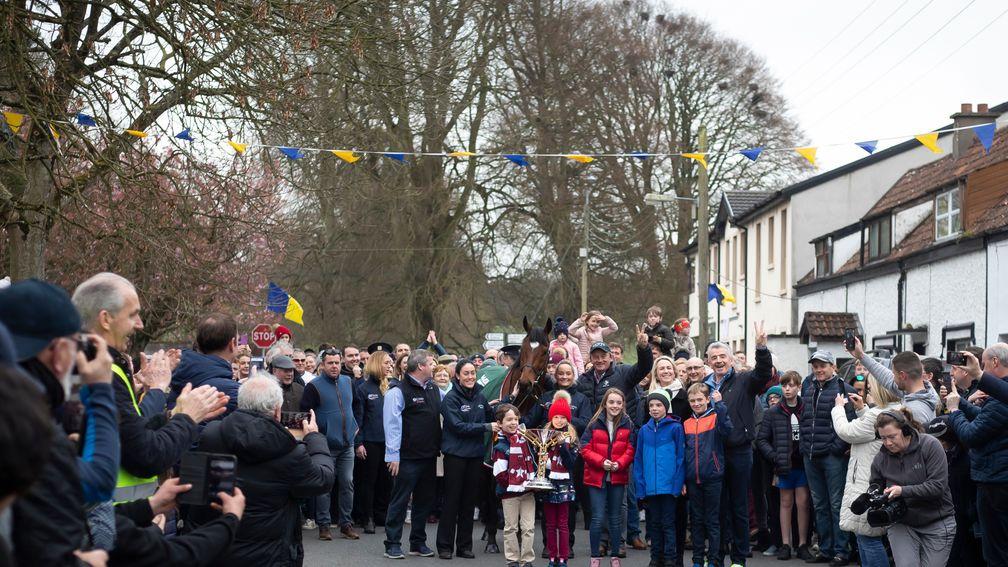 A big crowd turns out to see Tiger Roll parade through the village of Summerhill