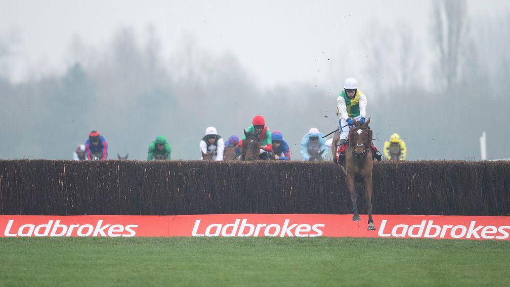Cloth Cap (Tom Scudamore) jumps the last fence and wins the Ladbrokes Trophy ChaseNewbury 28.11.20 Pic: Edward Whitaker/Racing Post