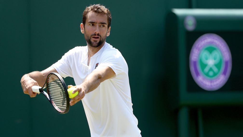Queen's king Marin Cilic gets in some practice at Wimbledon