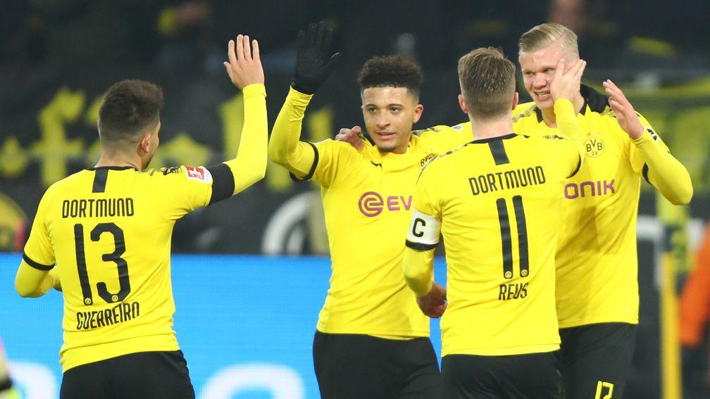 Borussia Dortmund celebrate an Erling Haaland (right) goal
