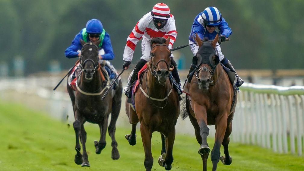 YORK, ENGLAND - AUGUST 21: Jim Crowley riding Alfaatik (R, blue) win The Sky Bet Handicap at York Racecourse on August 21, 2020 in York, England. Owners are allowed to attend if they have a runner at the meeting otherwise racing remains behind closed door