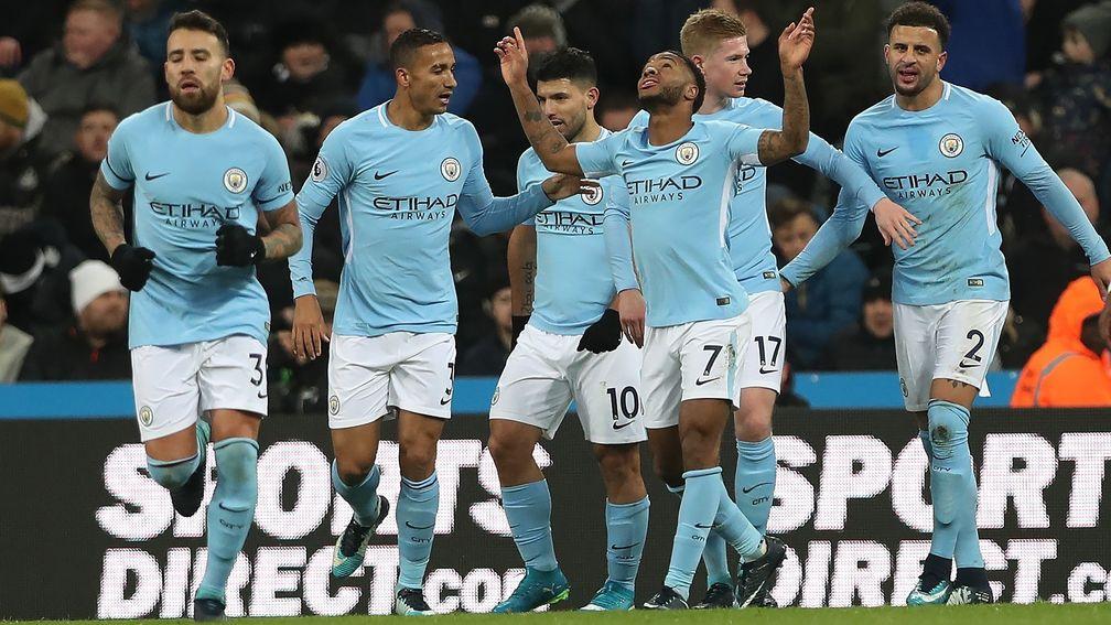 Manchester City celebrate Raheem Sterling's winning goal at Newcastle