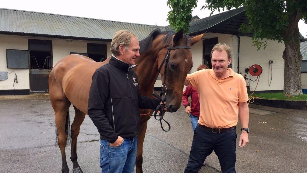 Michael and Rupert Bell flank Big Orange at Fitzroy Stables on Monday