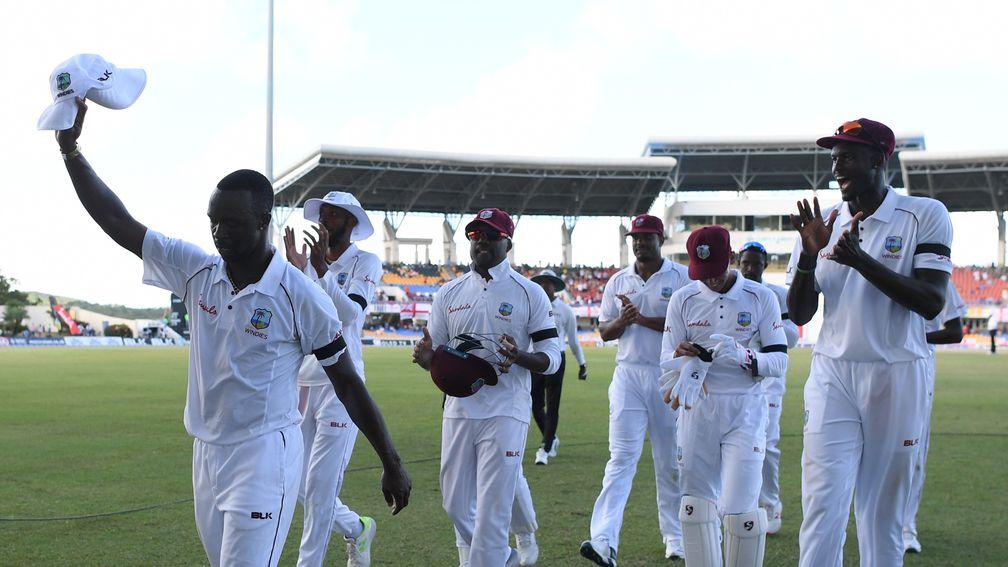 Kemar Roach leads the West Indies off the field during February's win over England