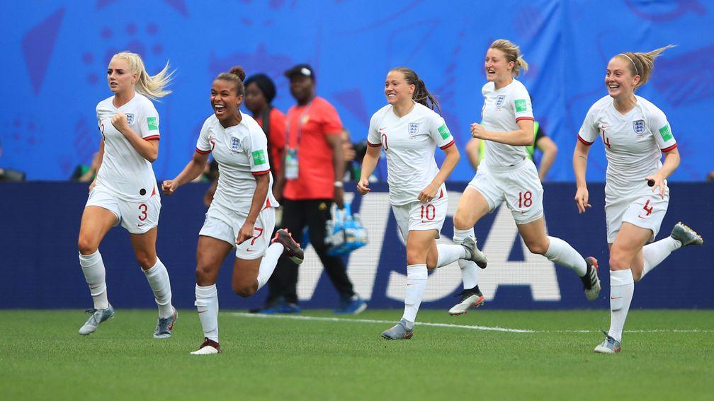 England celebrate their third goal, by Alex Greenwood, against Cameroon at Stade du Hainaut