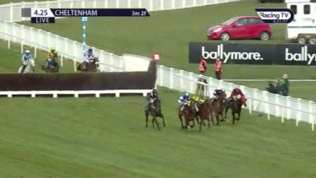 Sam Twiston-Davies (blue) helps James Davies regain his balance after The Mighty Don's mistake at the penultimate fence