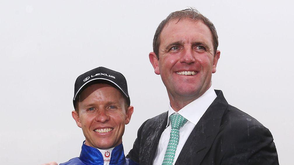 Kerrin McEvoy poses with Charlie Appleby after the Melbourne Cup