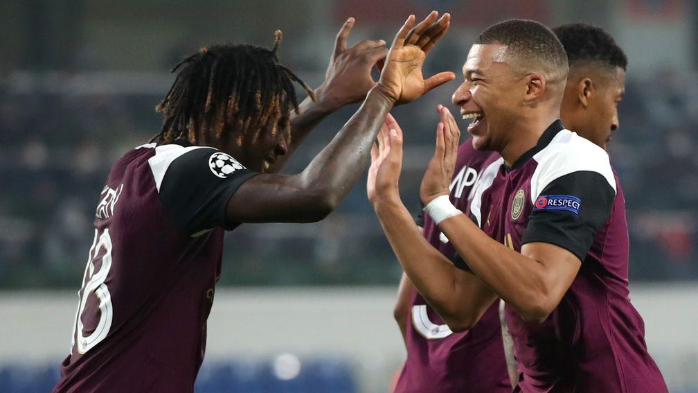 Moise Kean (left) and Kylian Mbappe celebrate a PSG goal
