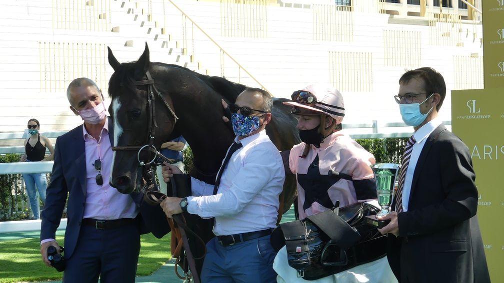 Iresine flanked by connections following his win in the La Coupe