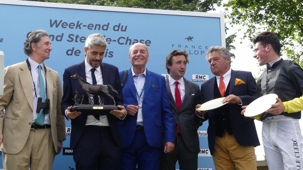 Power partnership: joint licence-holders Guillaume Macaire (second from right) and Hector de Lageneste (third from right) with jockey Baptiste Le Clerc after the Grade 1 victory of Altesse Du Berlais in the Prix Ferdinand Dufaure