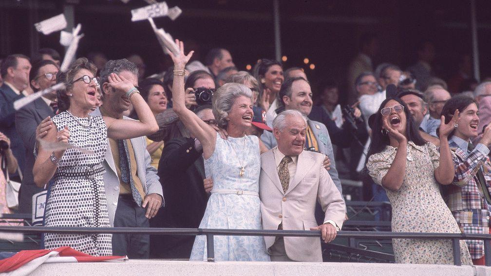 Penny Chenery (then Tweedy) celebrates with trainer Lucien Laurin as Secretariat completes the Triple Crown in the 1973 Belmont Stakes