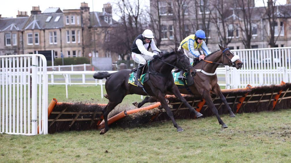 Bareback Jack (Brian Hughes, right) and Third Time Lucki fight it out in the Scottish Supreme Novices' Hurdle with the former coming out on top