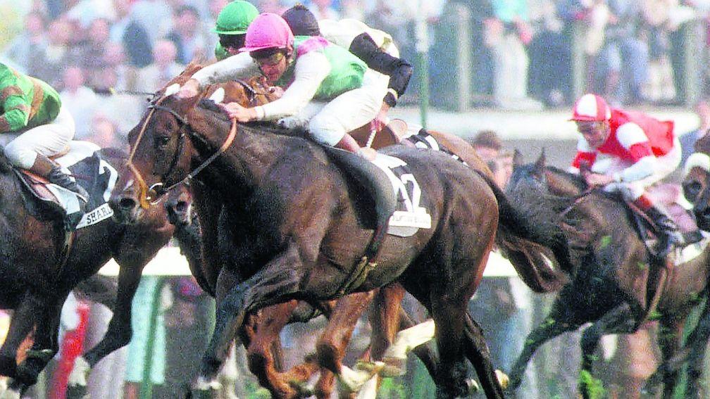 Dancing Brave comes with an irresistible surge under Pat Eddery to win the Arc
