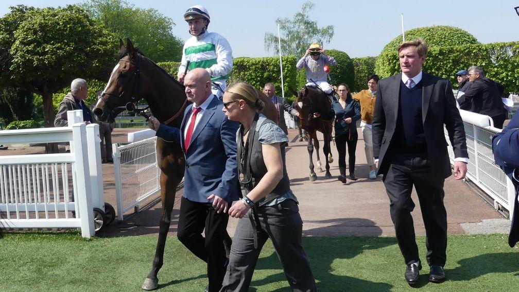 Kawida and Ed Walker return to the Saint-Cloud enclosure after finishing a close-up third in the Prix Cleopatre