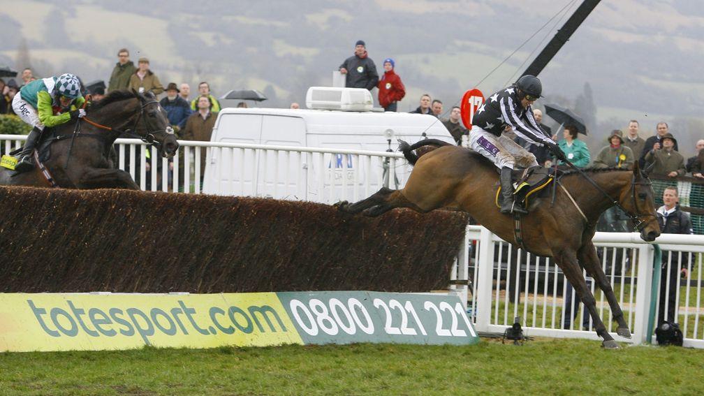 Imperial Commander and Paddy Brennan lead Denman over the last in the  2010 Cheltenham Gold Cup