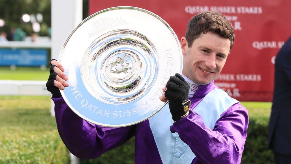Big winner: Oisin Murphy with the trophy after the Andrew Balding-trained Alcohol Free's victory in the Group 1 Sussex Stakes at Goodwood