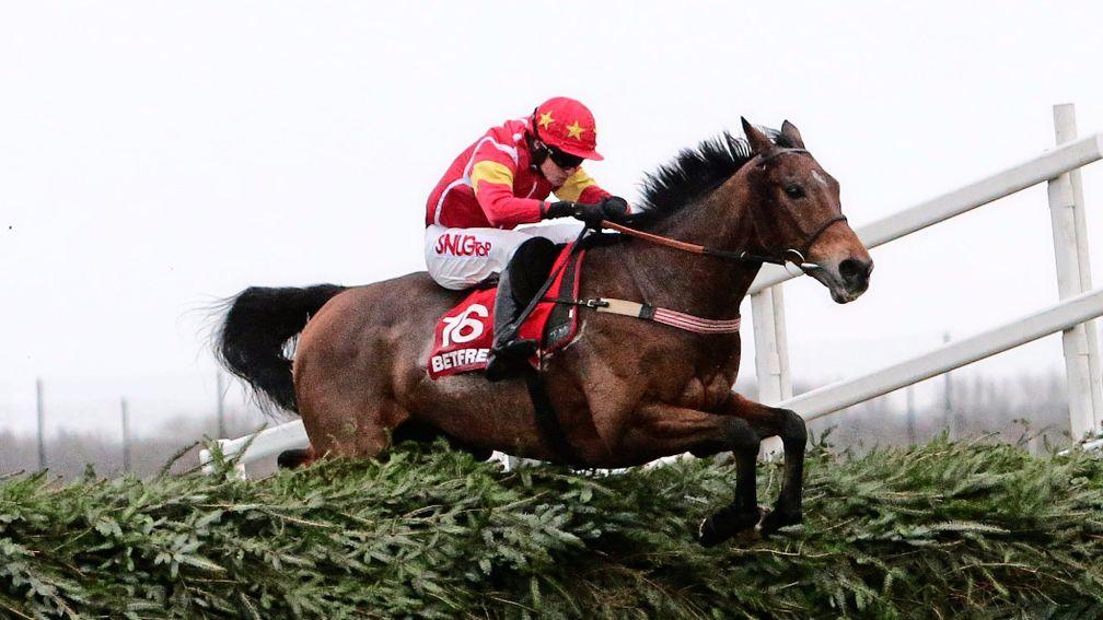 Highland Lodge and Henry Brooke on the way to victory in the 2015 Becher Chase