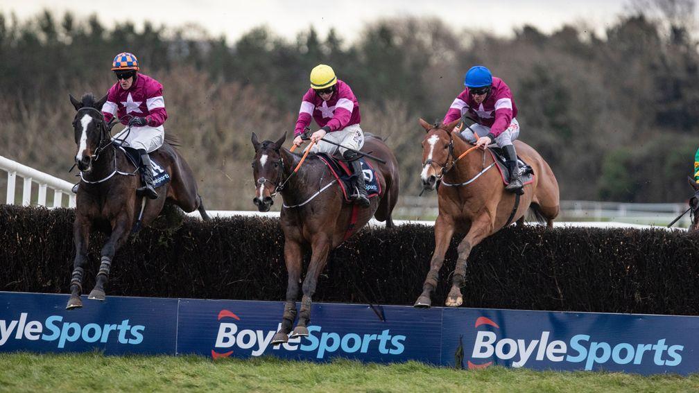 Dounikos (blue cap) jumps the last in a race dominated by Gigginstown