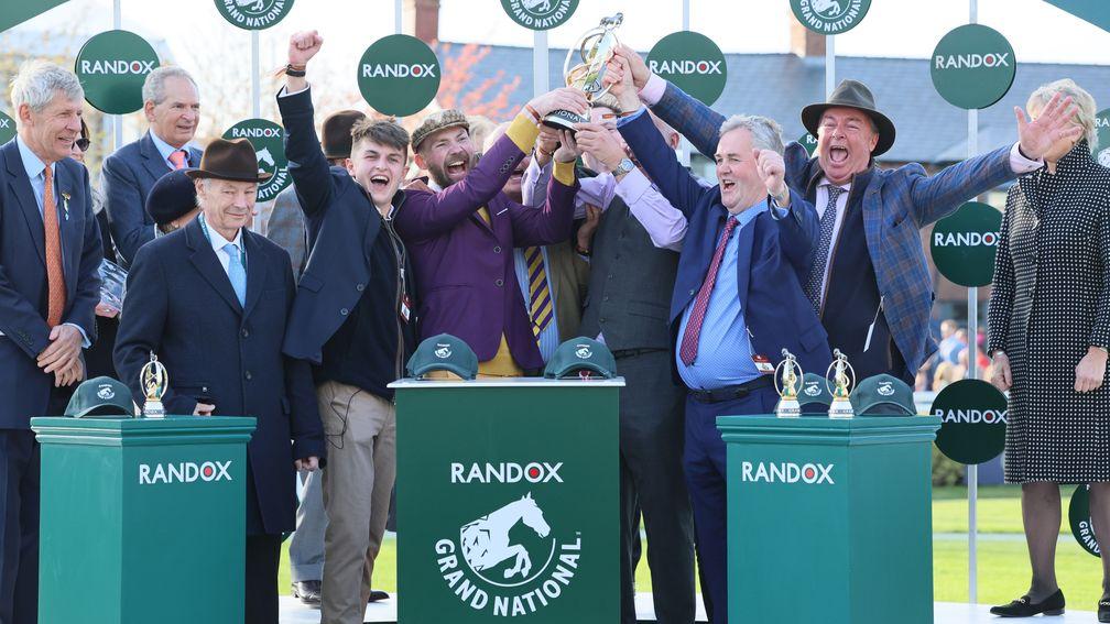 Cameron Sword (left, punching the air): enjoyed Grand National success as part-owner of Corach Rambler